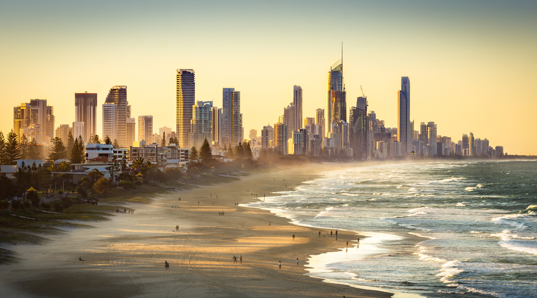 QLD beach coast with city skyline